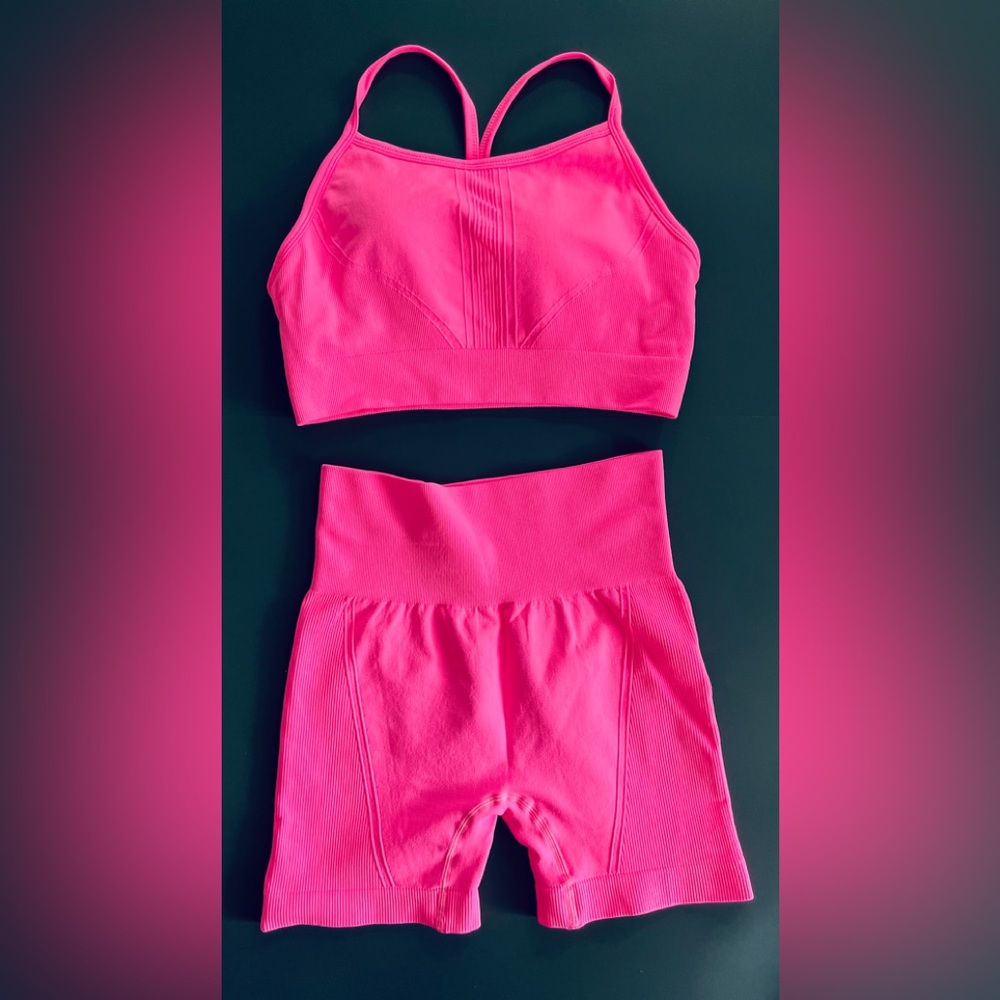 Hot pink sleeveless crop tank top sports and shorts
